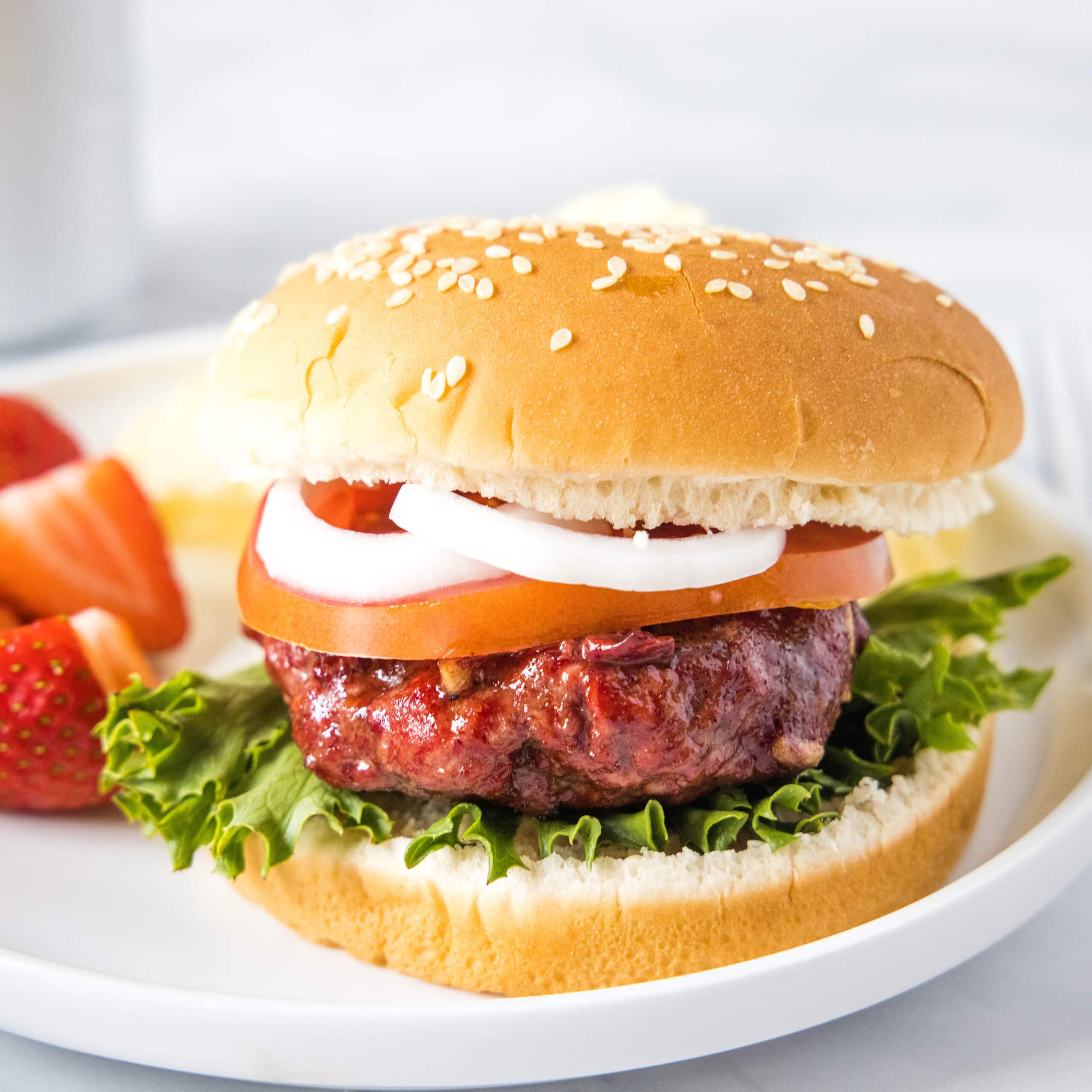 close up of a smoked burger on a bun