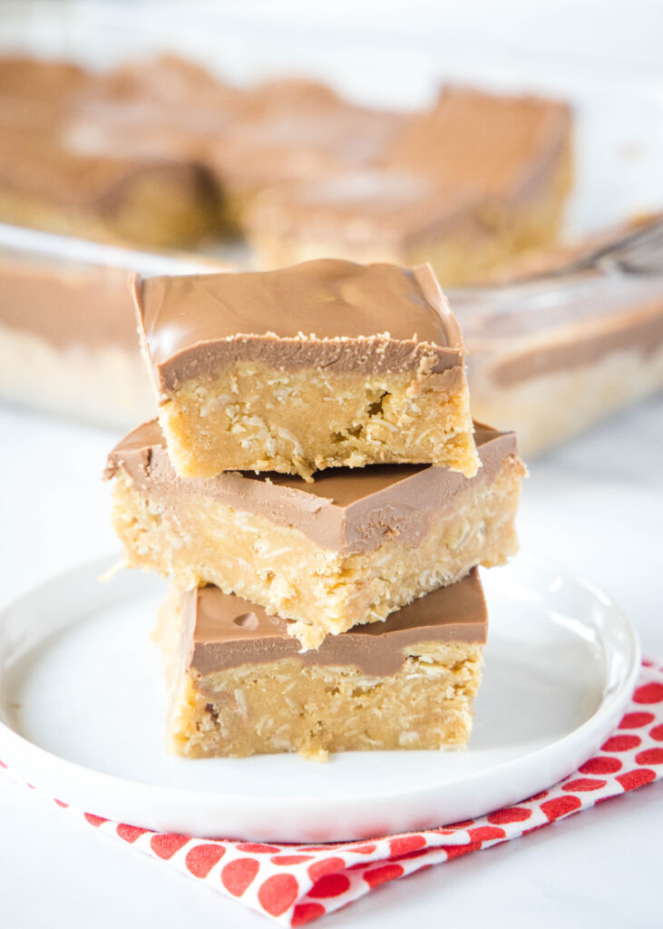 stack of peanut butter oatmeal bars on white plate