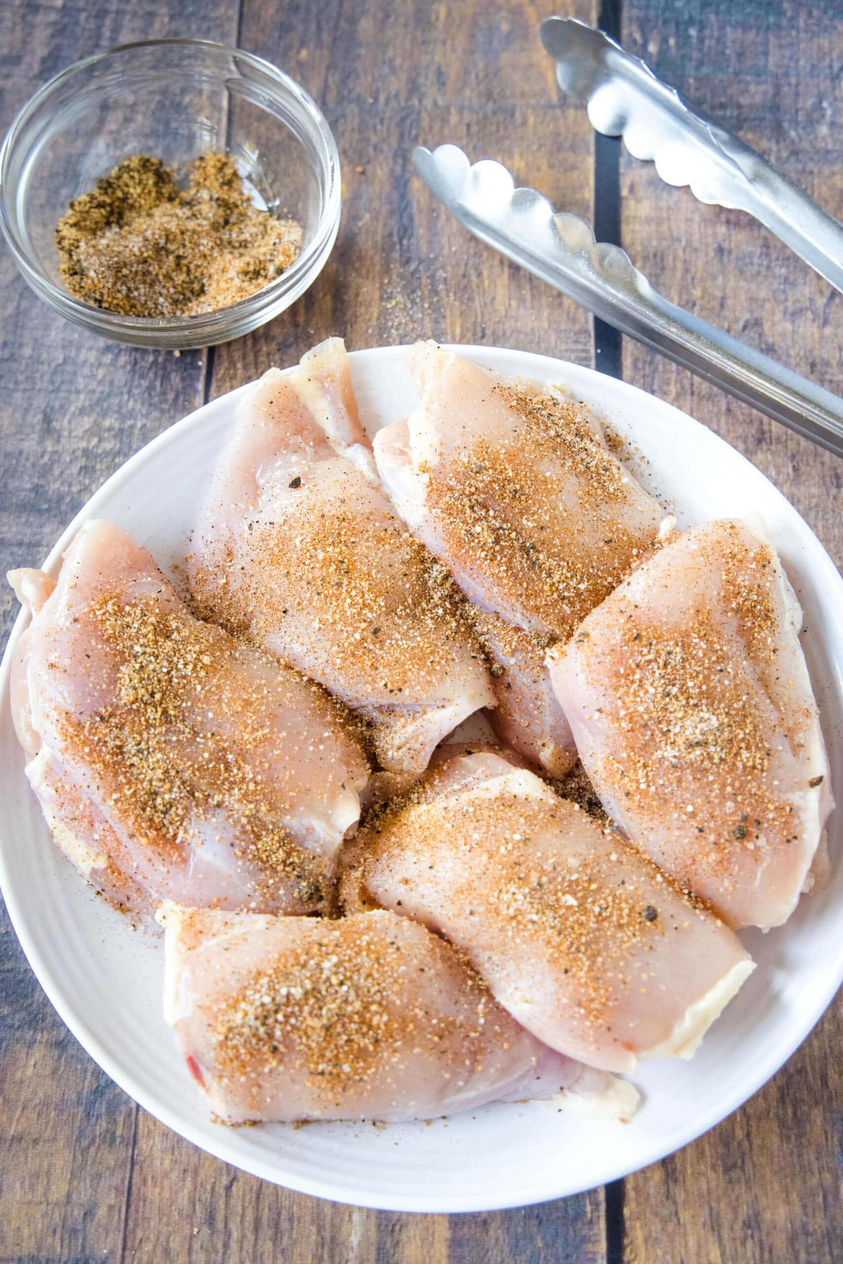 seasoned chicken thighs on a plate