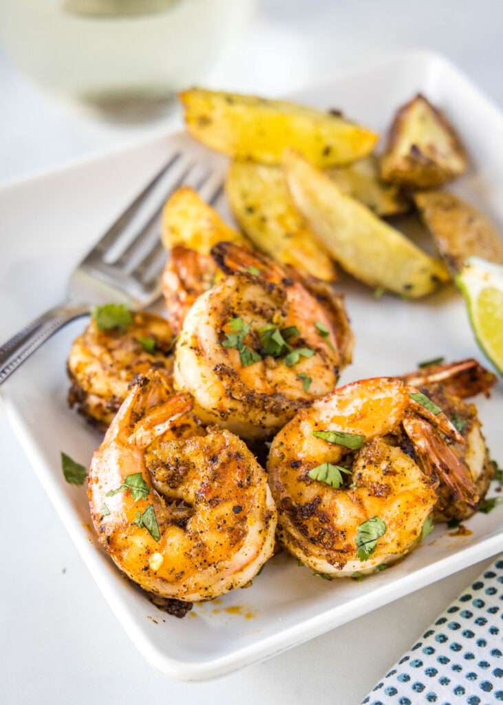 cooked shrimp on a plate with potatoes