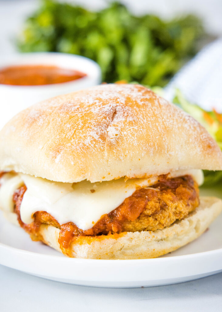 chicken sandwich with marinara and melted cheese