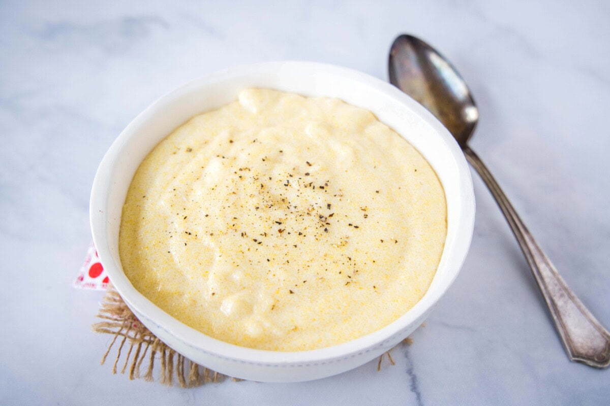 This Creamy Polenta Recipe is a delicious, creamy side dish that pairs with nearly any meal and is done in a flash!