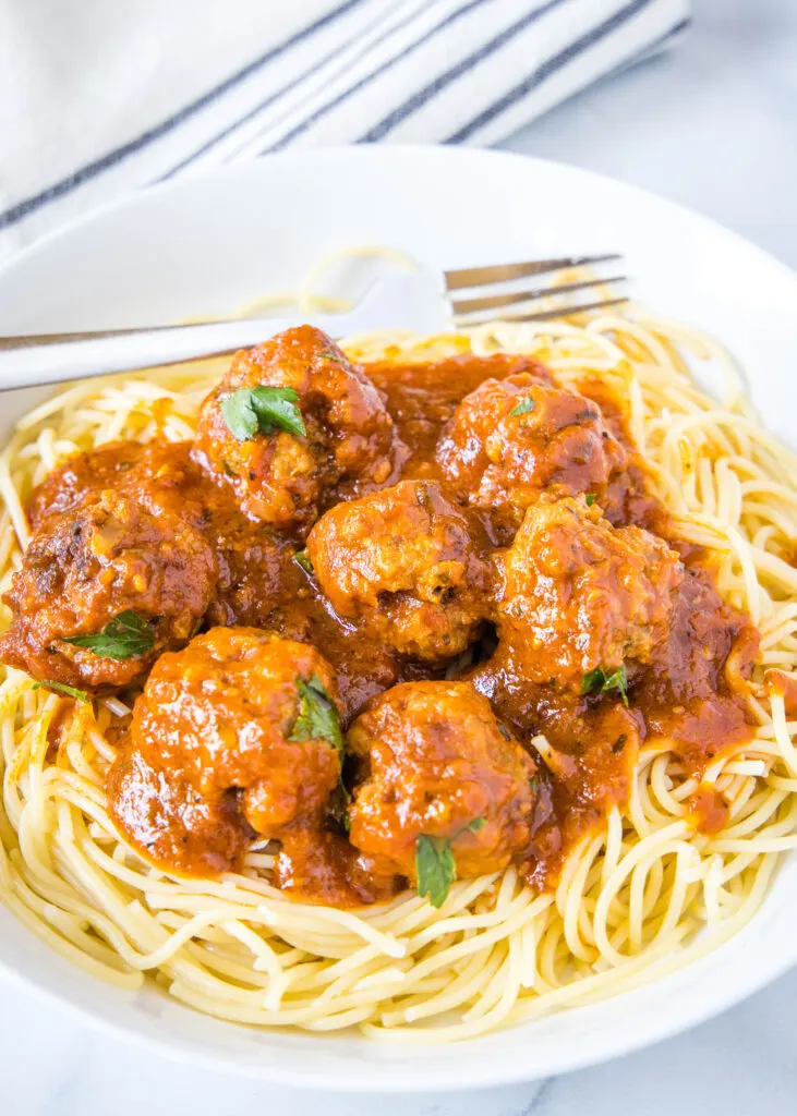 meatballs in marinara sauce over spaghetti