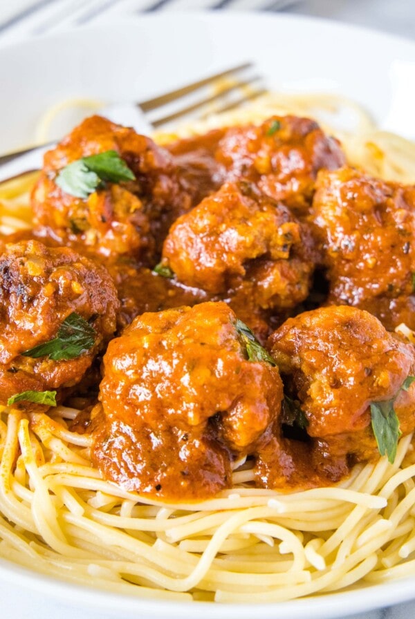 close up meatballs on spaghetti