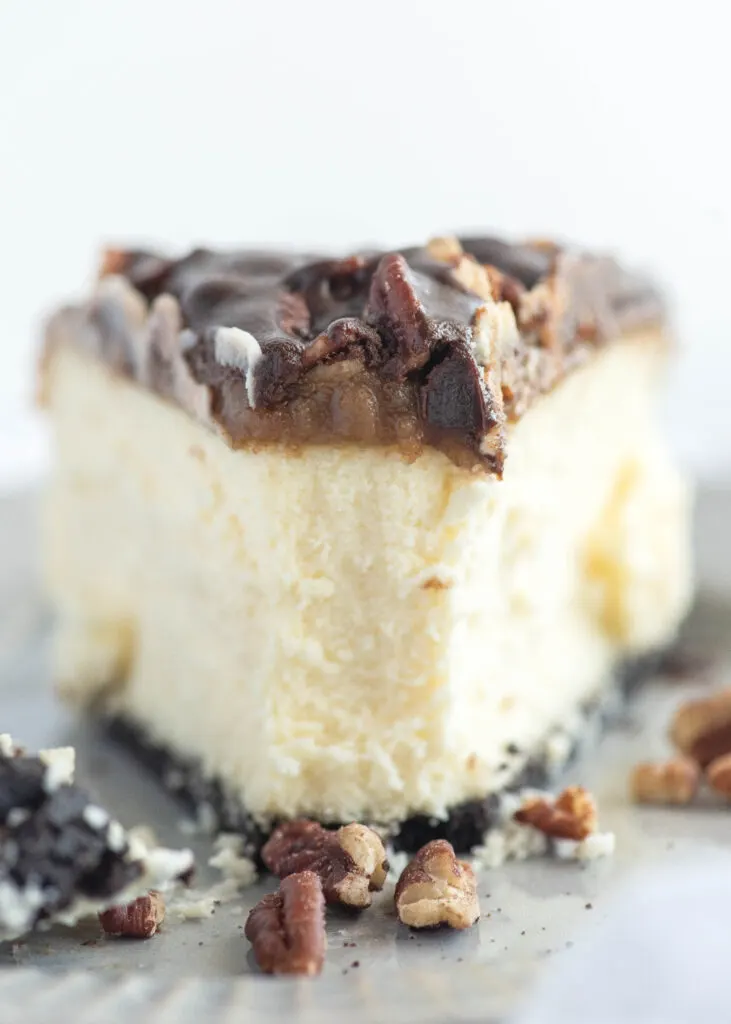 close up of creamy turtle cheesecake