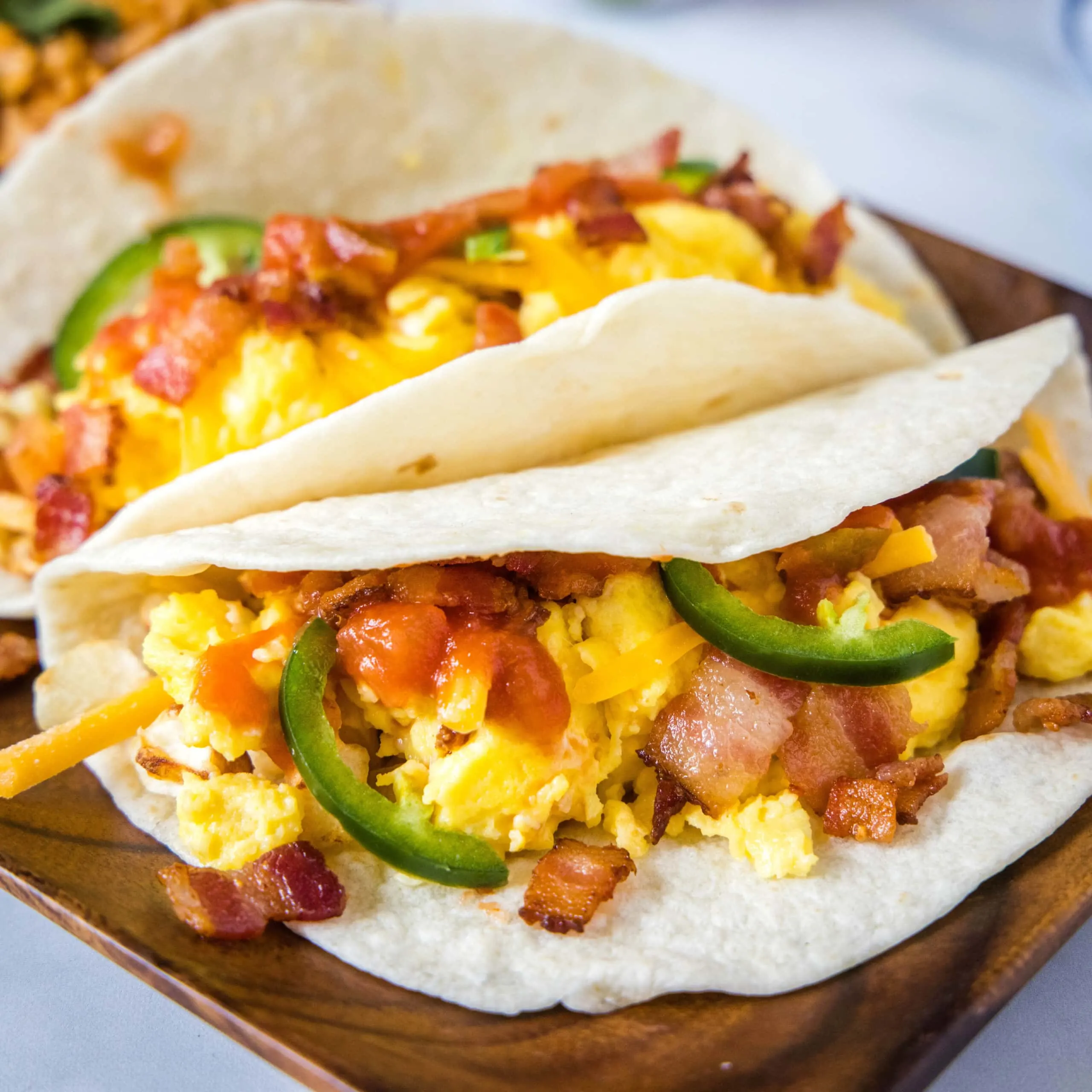 close up breakfast tacos on a plate