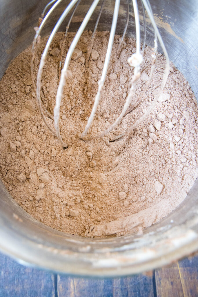 brownie mix in mixer with whisk