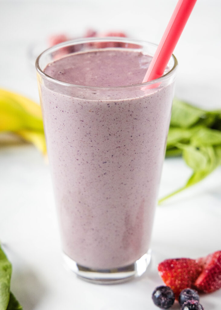mixed berry smoothie in a glass