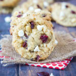 close up oatmeal cranberry cookie stacked on a table