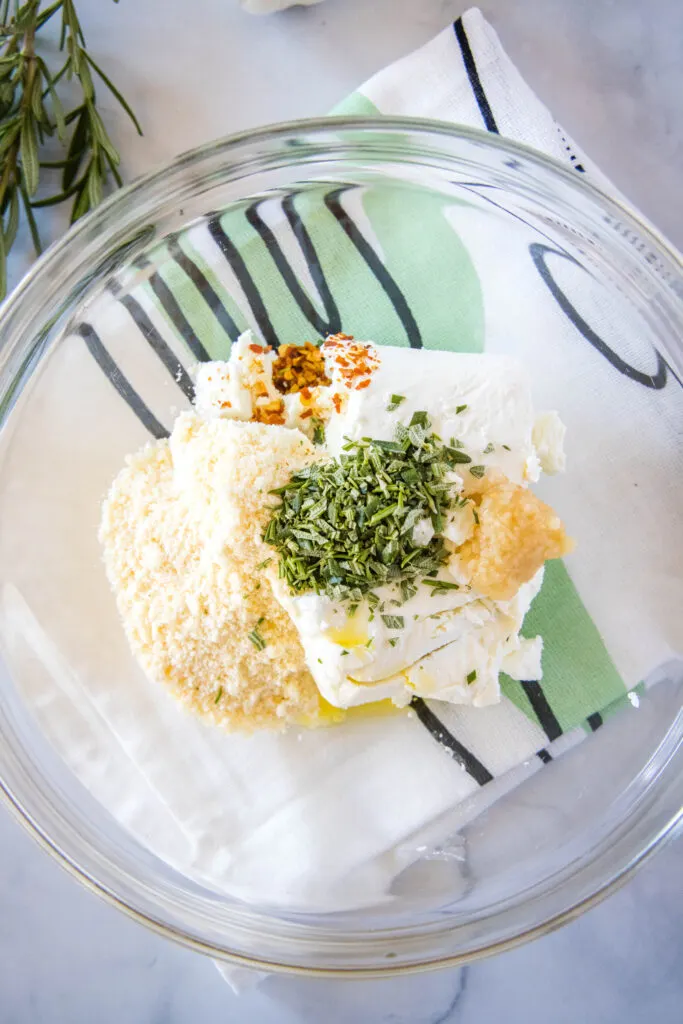 mixing bowl with goat cheese ingredients in it