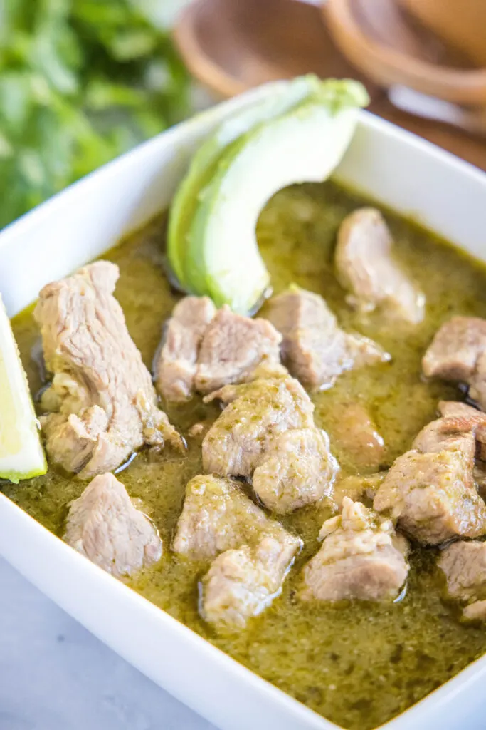 pork green chili in a white bowl