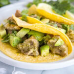 close up pork green chili tacos