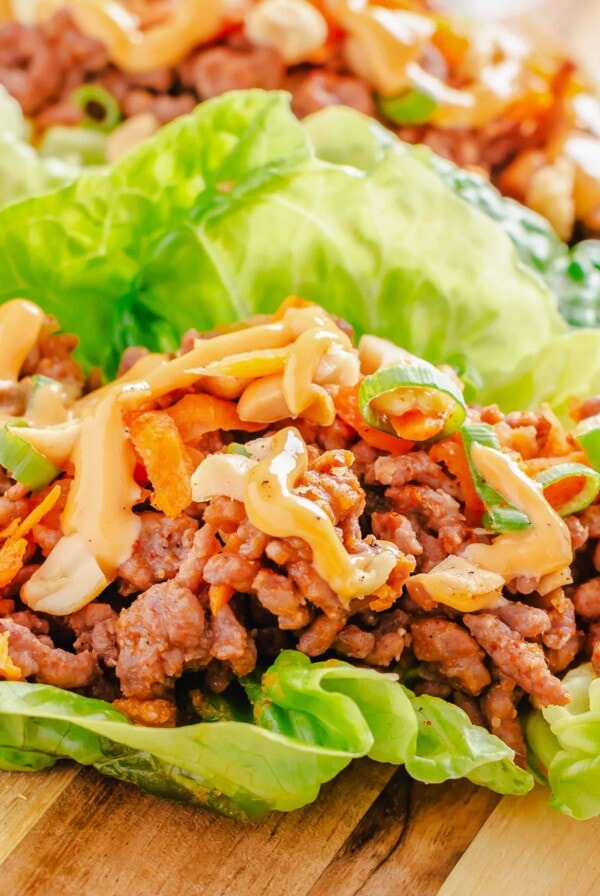 close up of lettuce wrap on a cutting board
