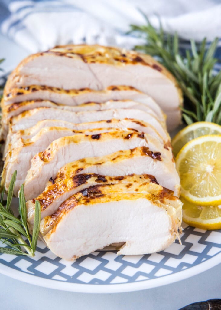 sliced turkey breast on serving plate