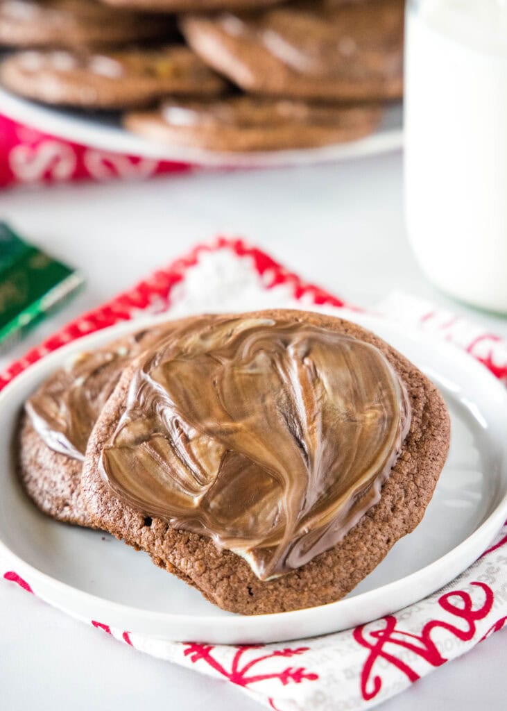 a white plate with chocolate andes mint cookies