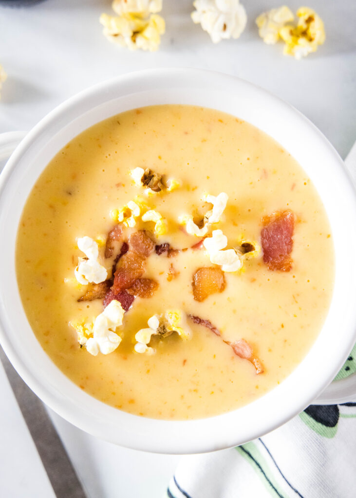 beer cheese soup in a white bowl