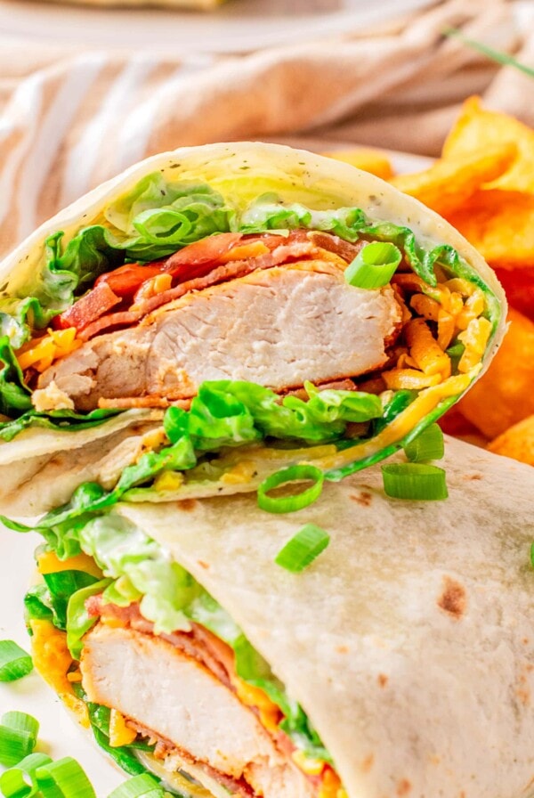 cropped in close up of chicken bacon ranch wrap