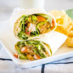 cropped in close up of chicken caesar wrap