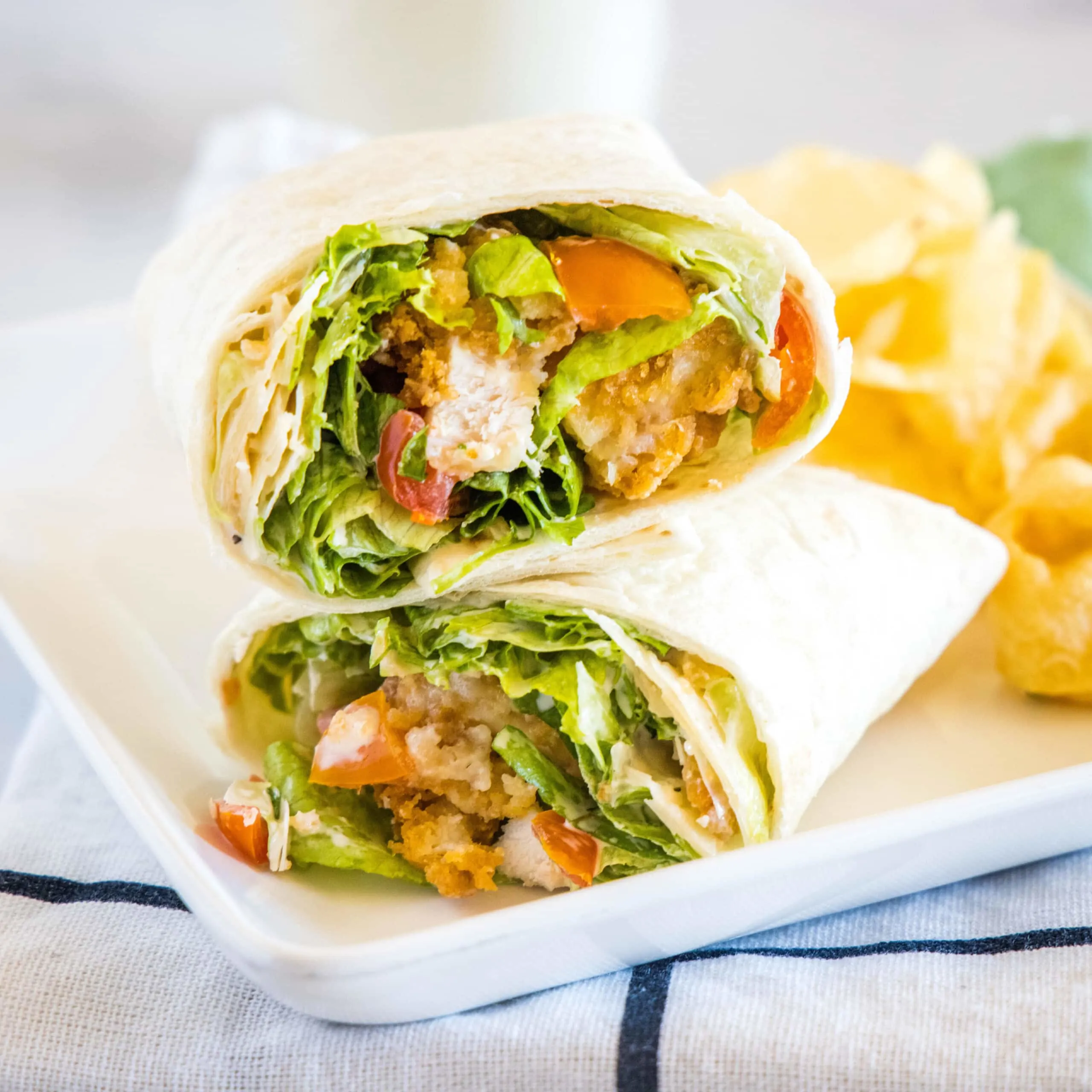 cropped in close up of chicken caesar wrap