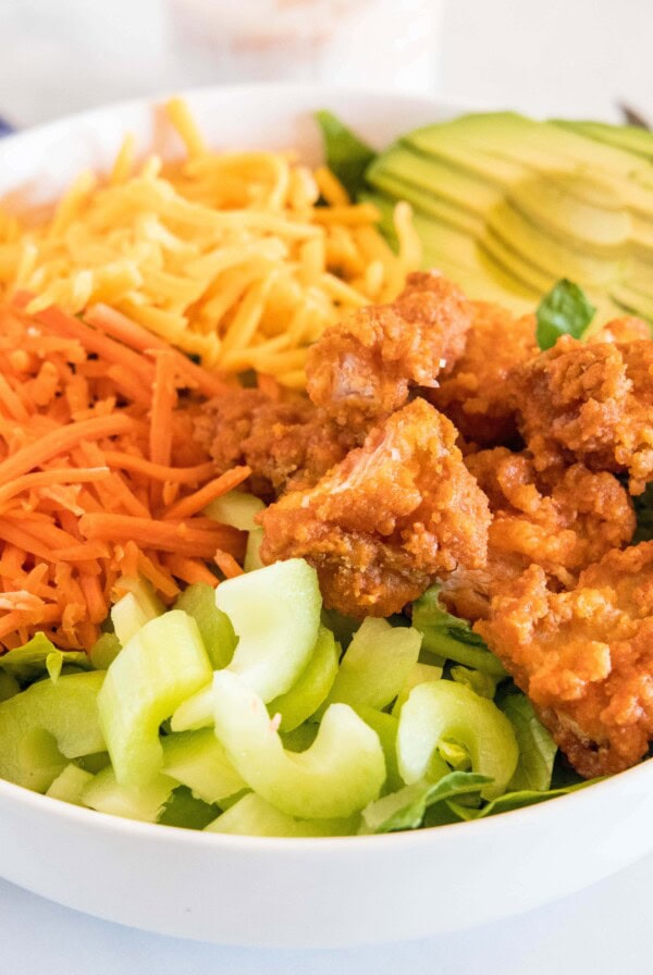 close up crispy buffalo chicken salad