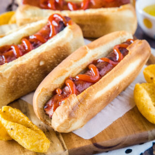 cropped in close up of air fryer hot dog with ketchup