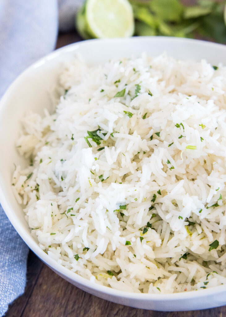 cilantro lime rice in a white bowl on a table