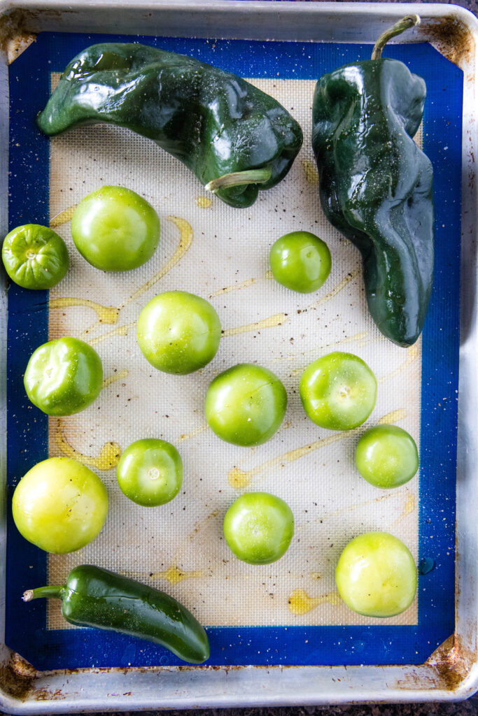 salsa verde ingredients on a baking tray