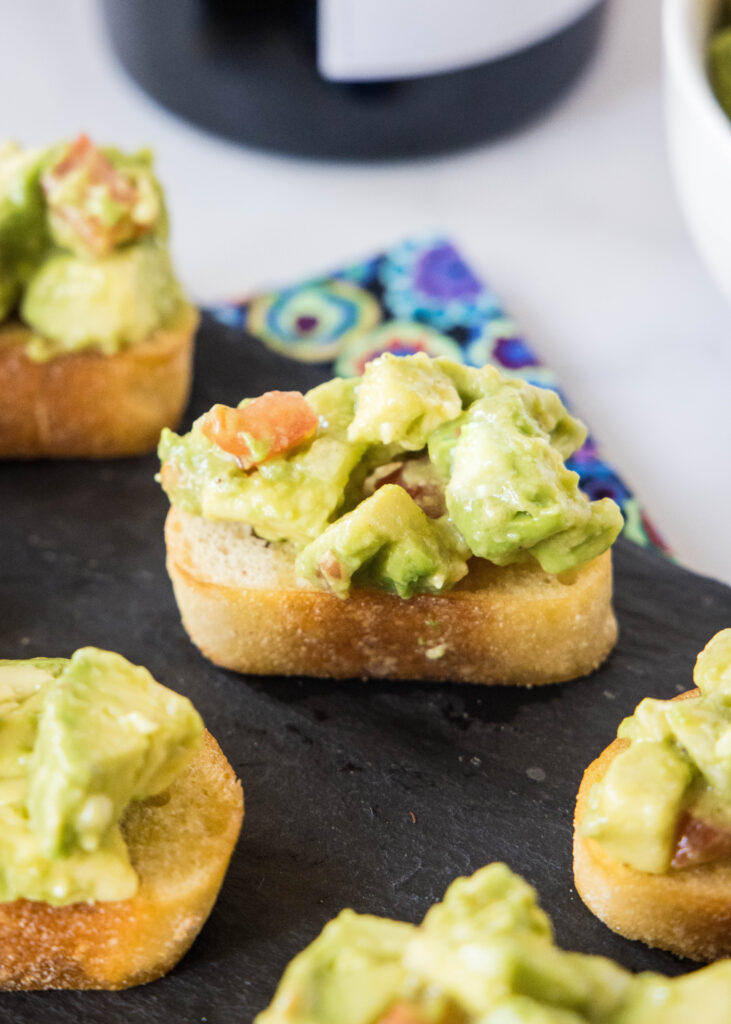avocado toast appetizer on a serving tray