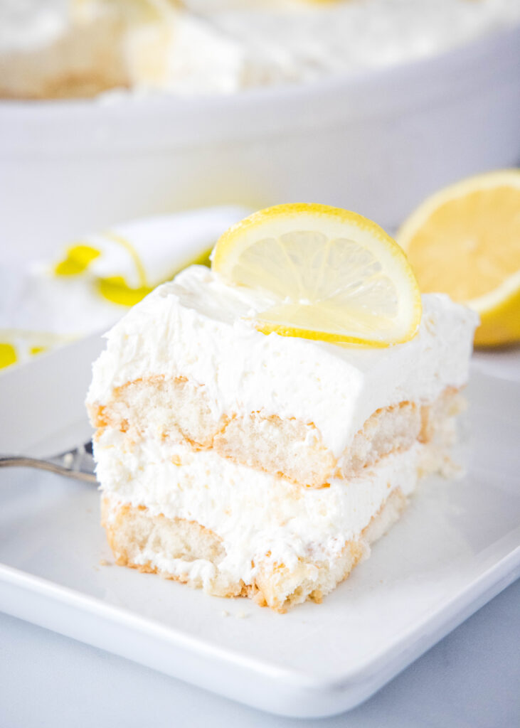 slice of lemon tiramisu on a white plate