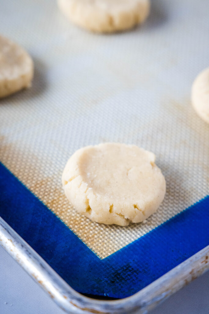 sugar cookie dough on baking sheet