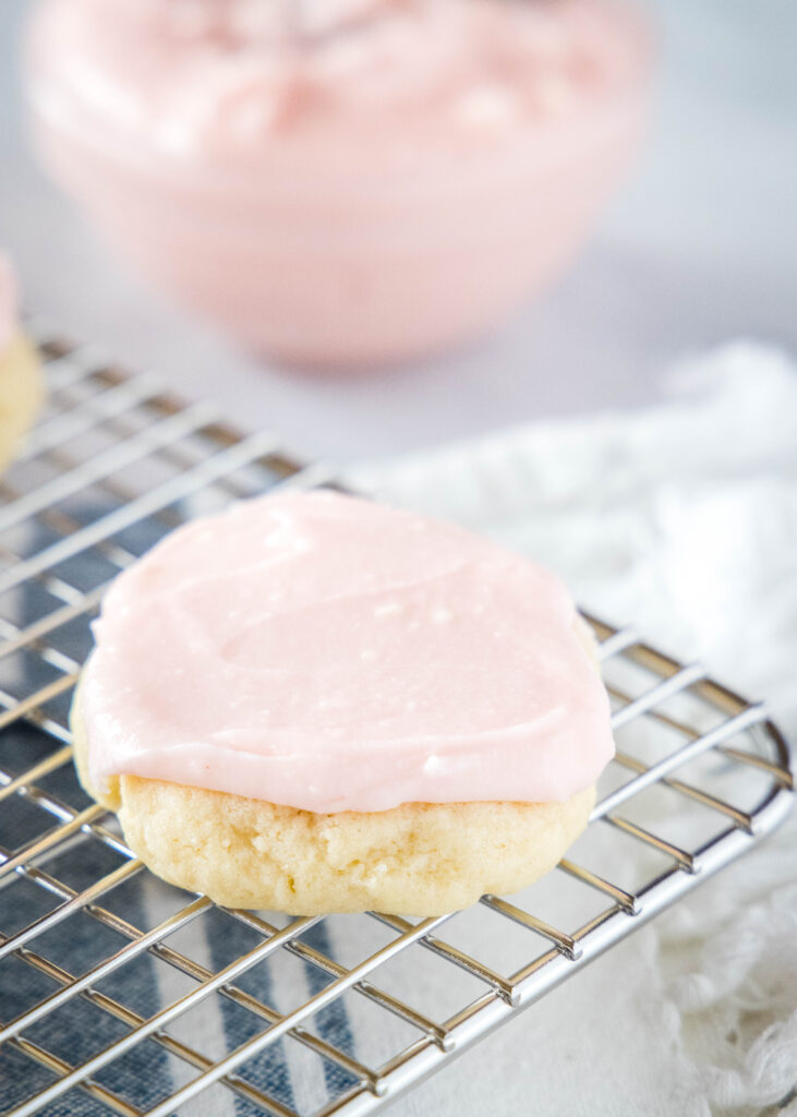 frosted sugar cookie on a rack