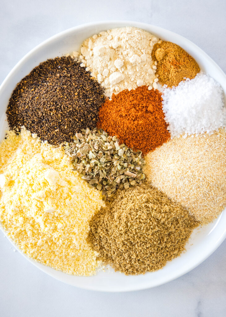 ingredients for taco seasoning on a plate
