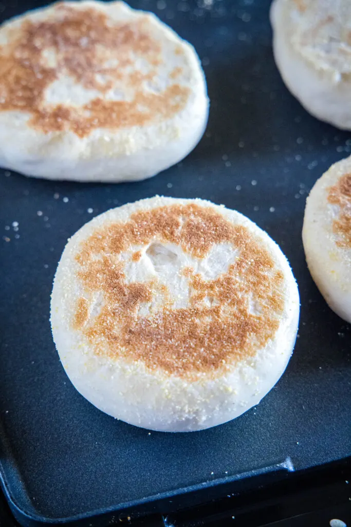 english muffins on the griddle
