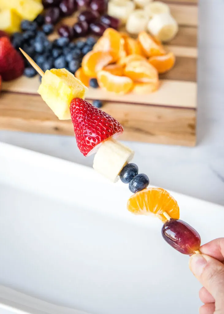 pieces of fruit on a wooden skewer