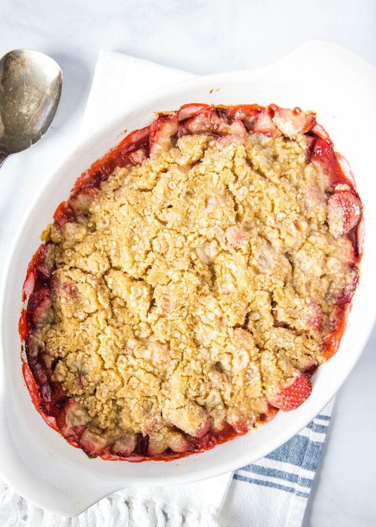 baked strawberry crumble on a towel