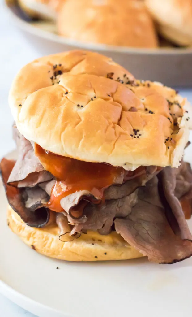 copycat arby's roast beef & cheddar sandwich on a white plate