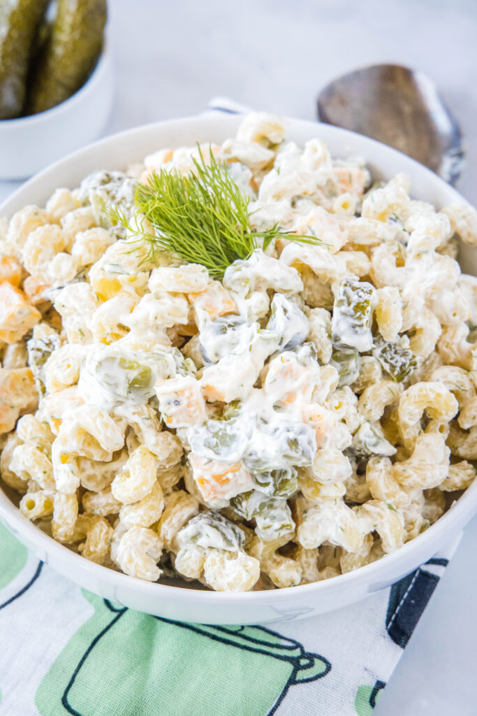 pickle pasta salad in a white bowl