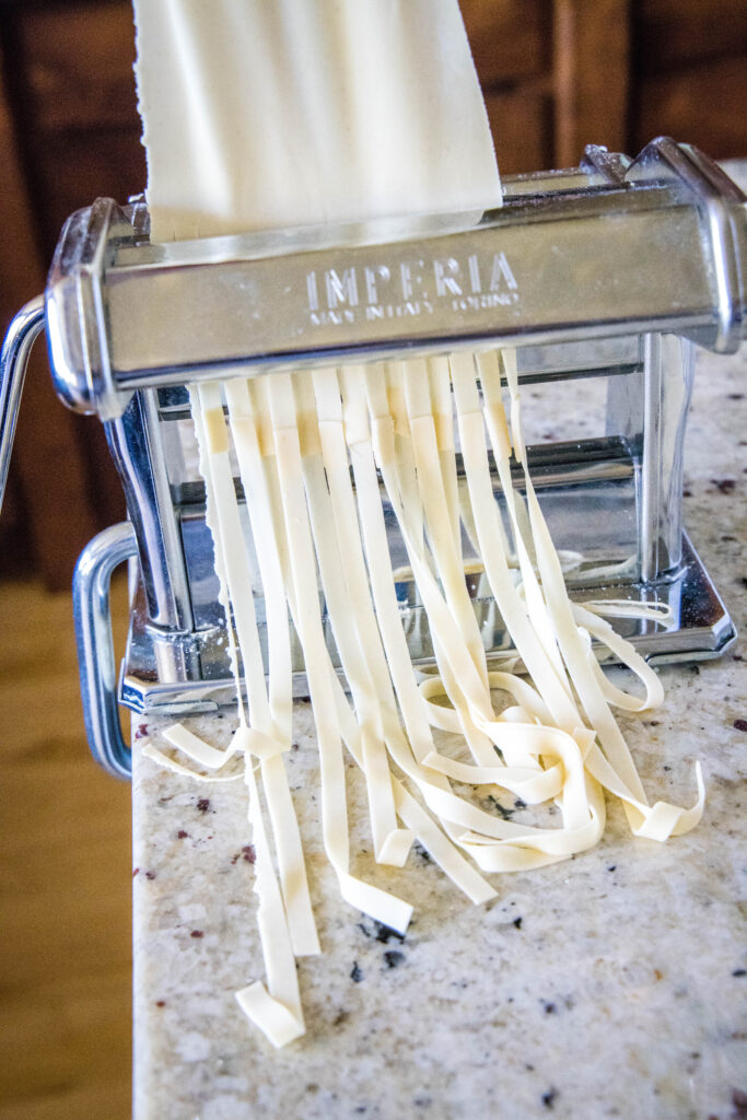 cutting pasta with the pasta cutter