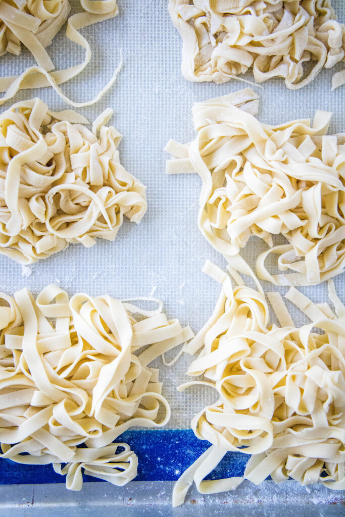 cut pasta on a baking sheet