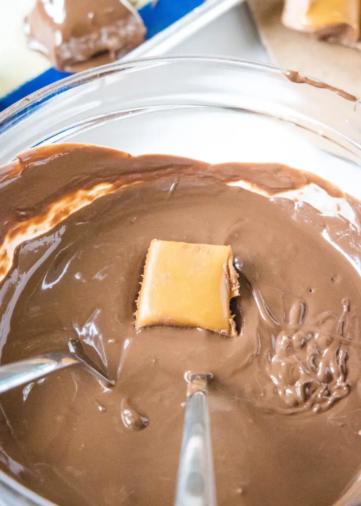 dipping candy in melted chocolate
