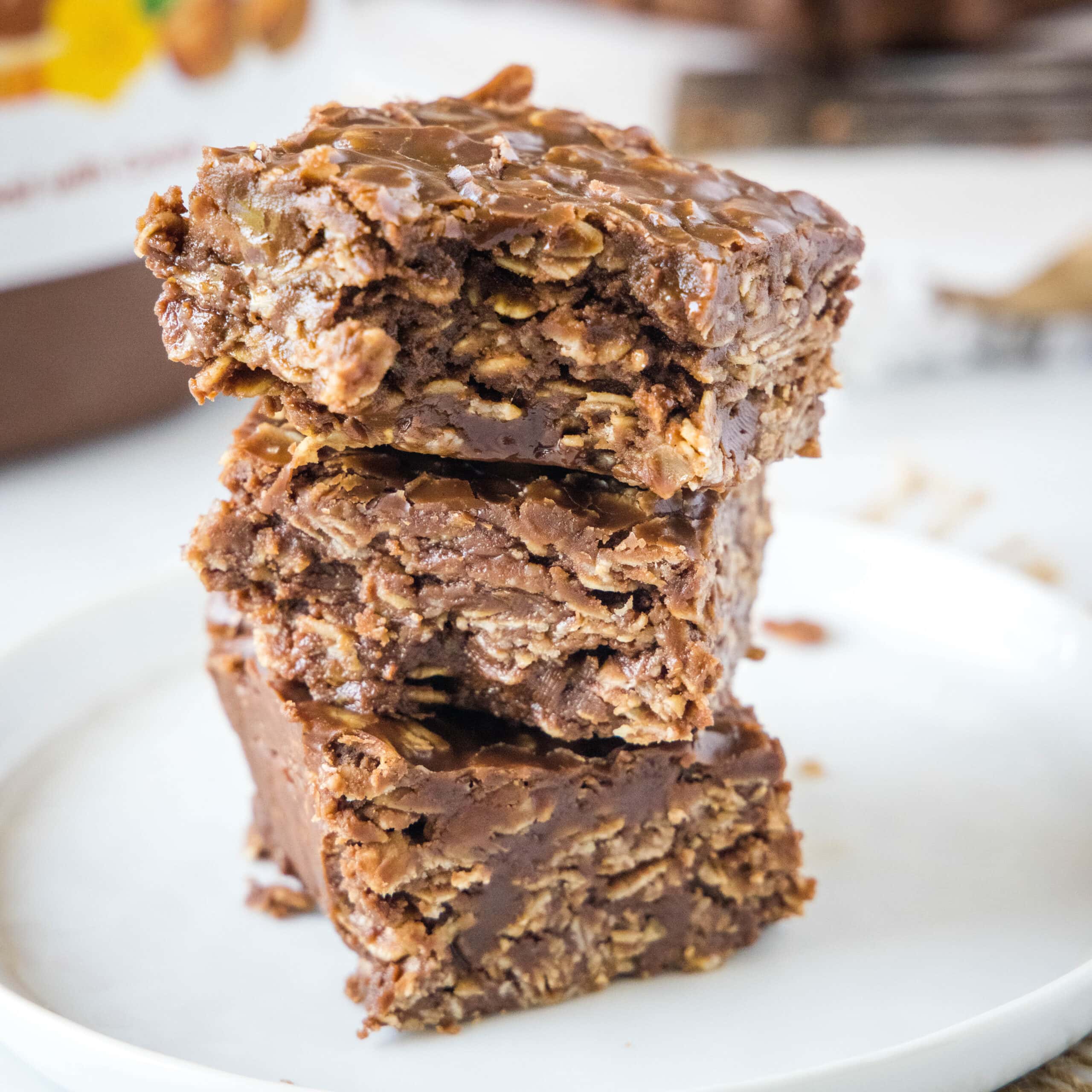 square image of stacked nutella bars with a bite missing from the top one