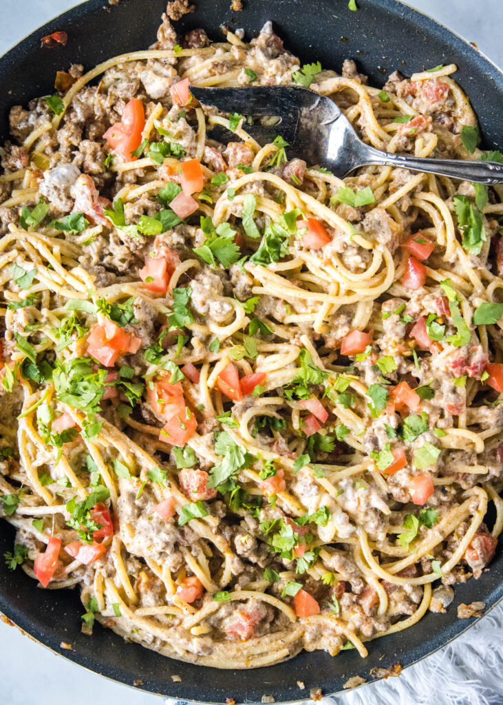 taco flavored spaghetti in a large skillet