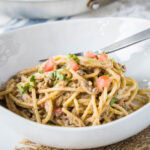 close up of taco spaghetti in a white bowl
