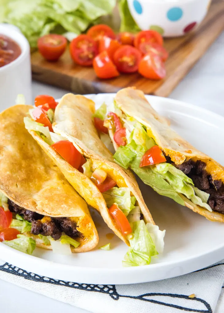 https://dinnersdishesanddesserts.com/wp-content/uploads/2022/06/Air-Fryer-Tacos-3-731x1024.jpg.webp