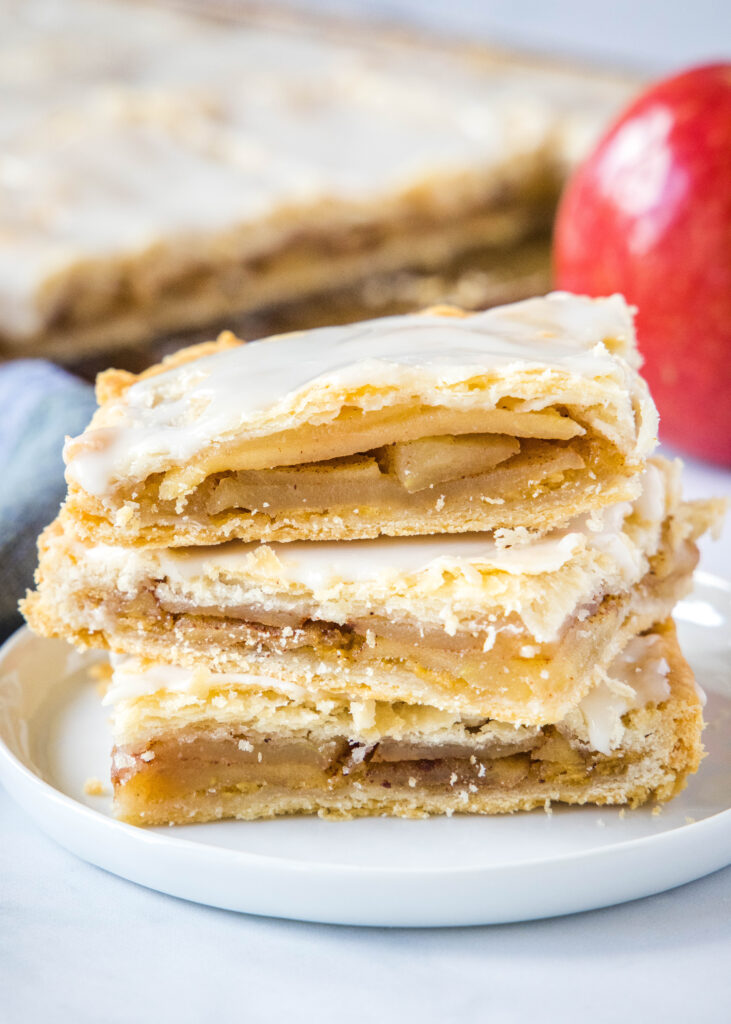 apple bars stacked on a white plate