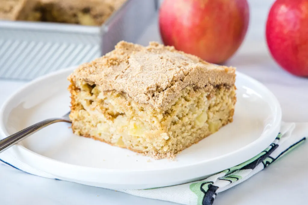 Apple Coffee Cake - a deliciously moist and tender coffee cake with lots of apples baked in and topped with a cinnamon and brown sugar streusel that takes it over the top!