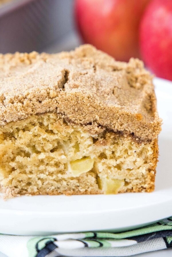 cropped in image of apple coffee cake on a plate with a fork