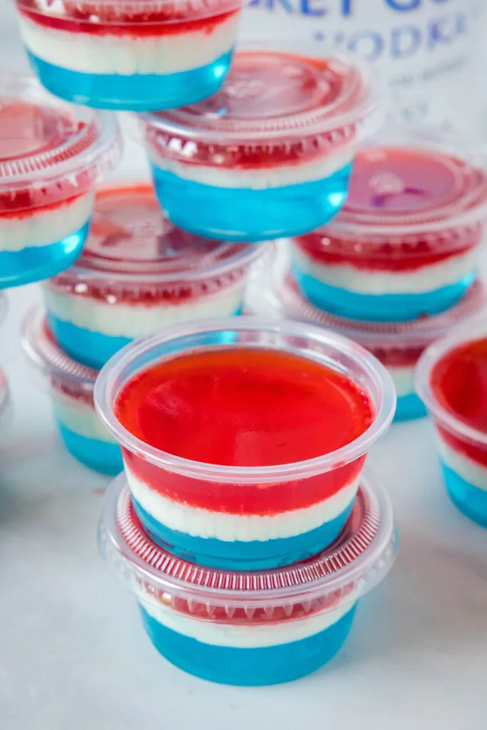 cups of red white and blue layered jello