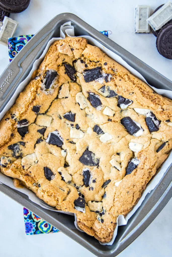 baked cookes and cream bars in baking dish