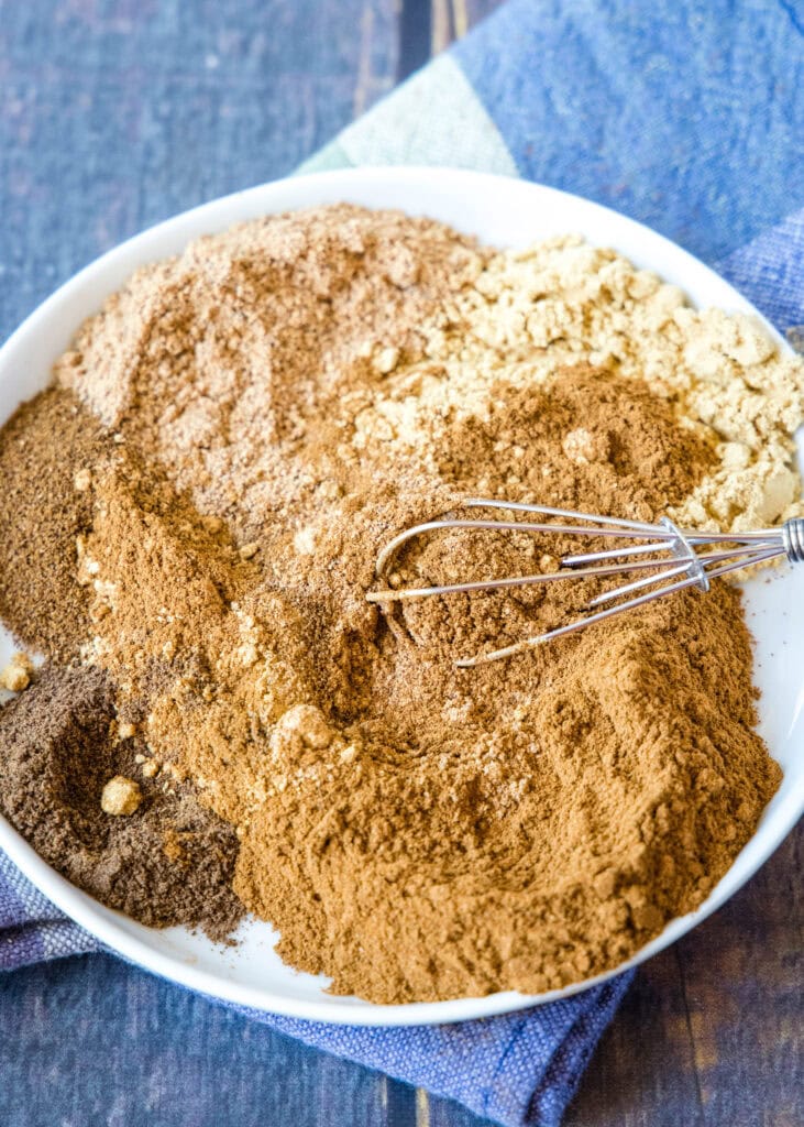 mixing pumpkin pie spice ingredients together